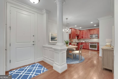 Entrance Foyer, Dining, and Kitchen - Virtually Staged