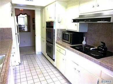 Kitchen features Kitchenaid cook top and Frigidair