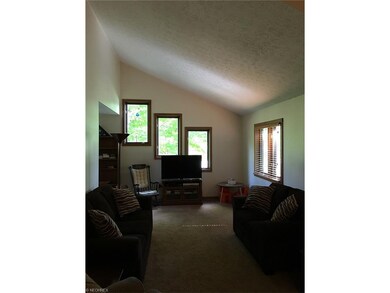 Another view of the vaulted living room from the d