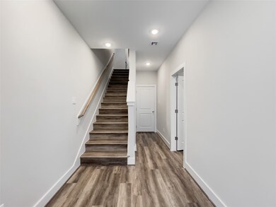 Entryway to first floor bedroom entrance to the ri