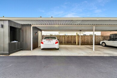 Large carport with enclosed storage area