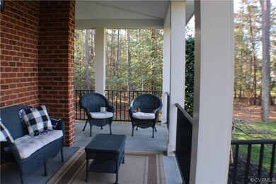 Front porch of the gorgeous, stately brick home w/