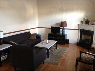 Living Room. Notice the chair rail upgrade.  Also