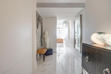 Hallway featuring a healthy amount of sunlight
