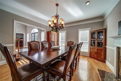 Large dining room with heavy crown molding and coz