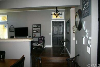 A view from the dining area back toward the front 