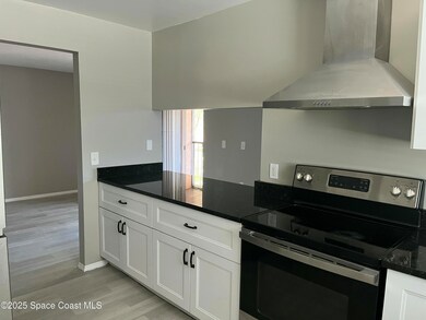 4127 Pinewood Dr NE unit 6, Palm Bay, FL 32905 - photo 3