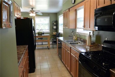 This spacious kitchen shines with beautiful update