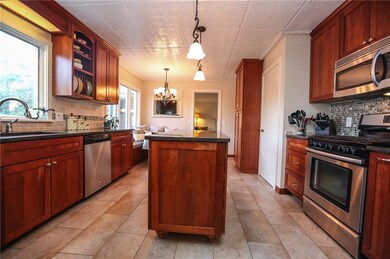 Stainless steel appliances, moveable island