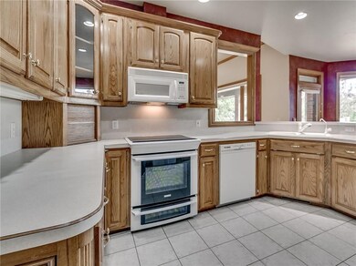 Kitchen with oak cabinets and tons of storage/work
