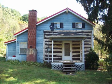 OTHER SIDE OF HOUSE WITH COVERED PORCH
