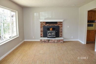 Spacious Living Room with Fireplace