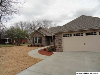 Two car garage with room for work bench area.