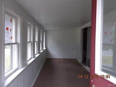 ENCLOSED FRONT PORCH