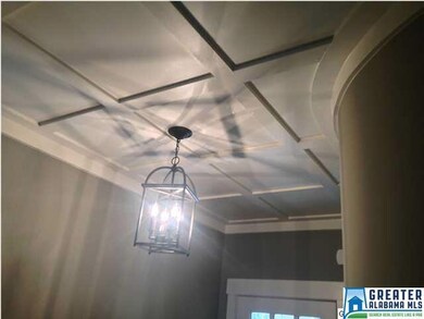 The customer ceiling treatment in the foyer really