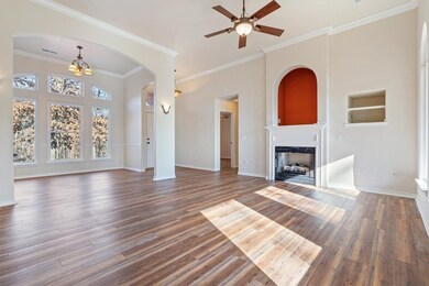 Looking from living room into the dining room and entry.