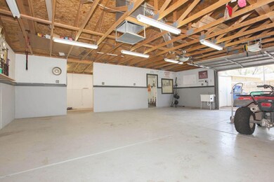 Garage-Workshop w/Storage Rooms