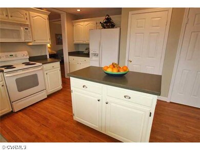 Kitchen - Renovated kitchen with wood floor, trey 