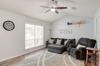 Another view of the spacious living area with remote control fan.