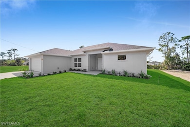 View of front of property featuring roof with shin