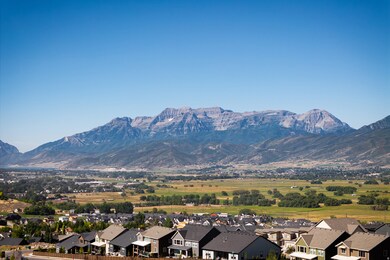 Mountain view featuring nearby suburban area
