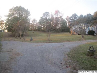 Drive up this private driveway where you can turn 
