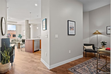Den area looking into the kitchen and living room
