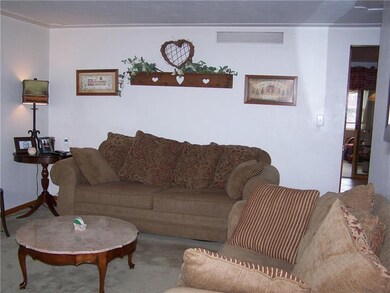 Living Room has nice detailing on the ceiling