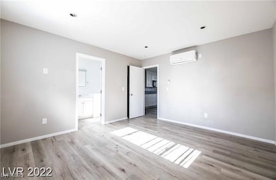 Unfurnished bedroom with light wood-style floors,