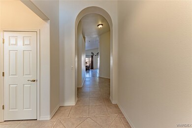 Corridor with light tile floors
