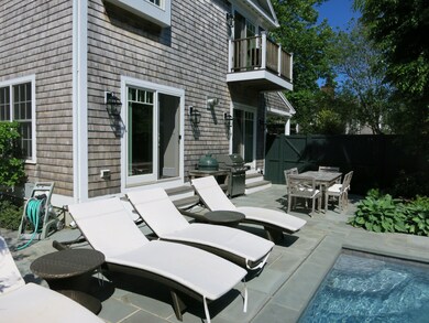 Outdoor patio and grill area.