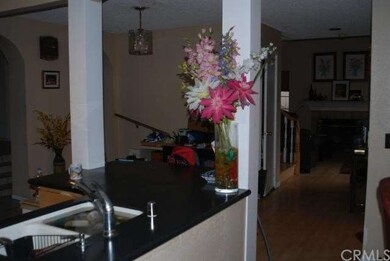 Kitchen through to living room