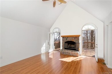 The newly-painted Great Room with a wood burning f