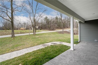 Covered porch with stamped concrete walk
