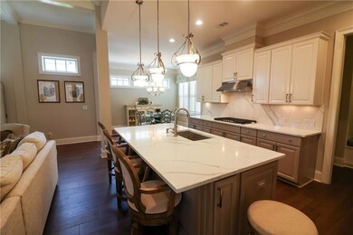 Completely updated kitchen with stunning quartz countertops and backsplash.