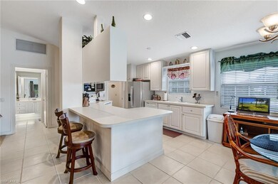 Kitchen with stainless steel appliances, a sink, a