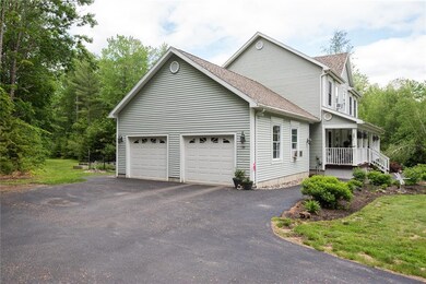 Nice landscaping surrounds the house