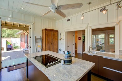 Kitchen view #4: French doors open to beautiful de