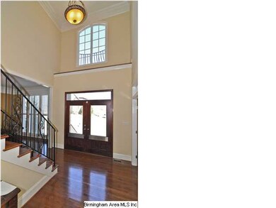 What a GRAND entrance!  A sweeping staircase, larg
