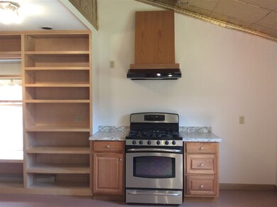 Newly redesigned cooking area with open shelving
