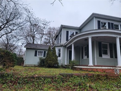 View of front of property with covered porch