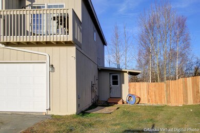 Side with attached out building