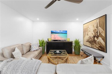 Living room featuring light hardwood / wood-style 