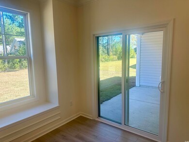 Entryway with baseboards and hardwood / wood-style floors