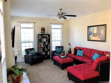 Family room with lots of windows and natural light