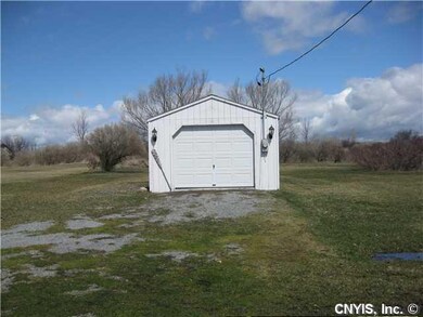 Garage. One car garage on separate parcel.