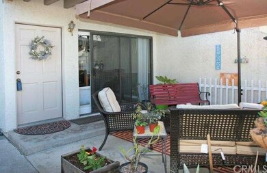 Large Inviting Patio Leads to Front Door