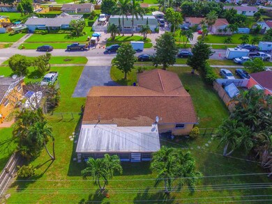 1675 Kudza Rd, West Palm Beach, FL 33415 - photo 5