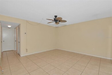 The living room, and access to the bedrooms