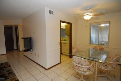 Living Room into Dining and Kitchen